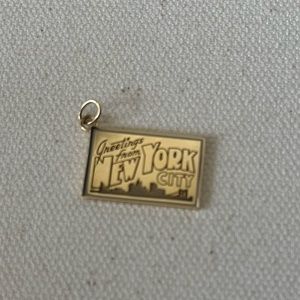 Gold Tiffany and co post card charm New York yellow gold